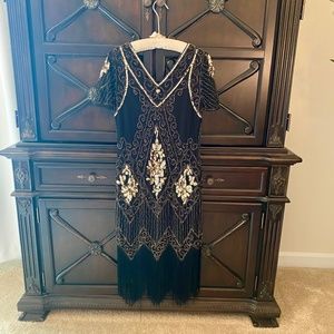 Black and gold sequin and fringed flapper dress